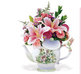 teleflora's lena liu hummingbird teapot bouquet